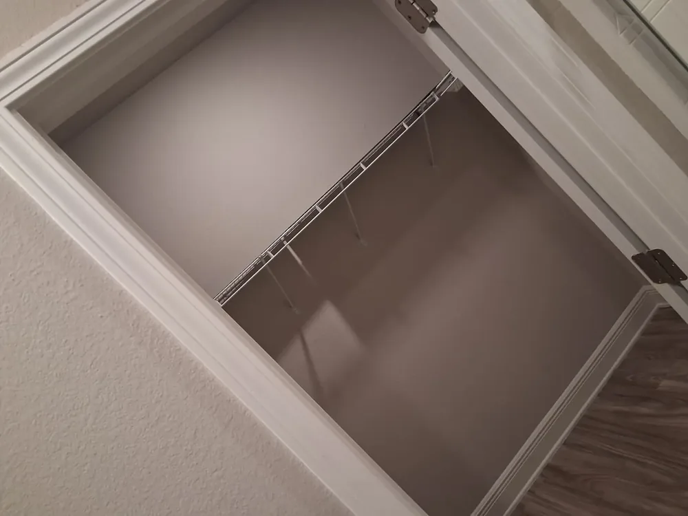 Finished closet interior with shelving rod
